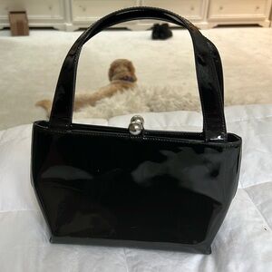 Furla evening bag. Dimensions of bag 10” wide top 8.5” base and 6.5 tall